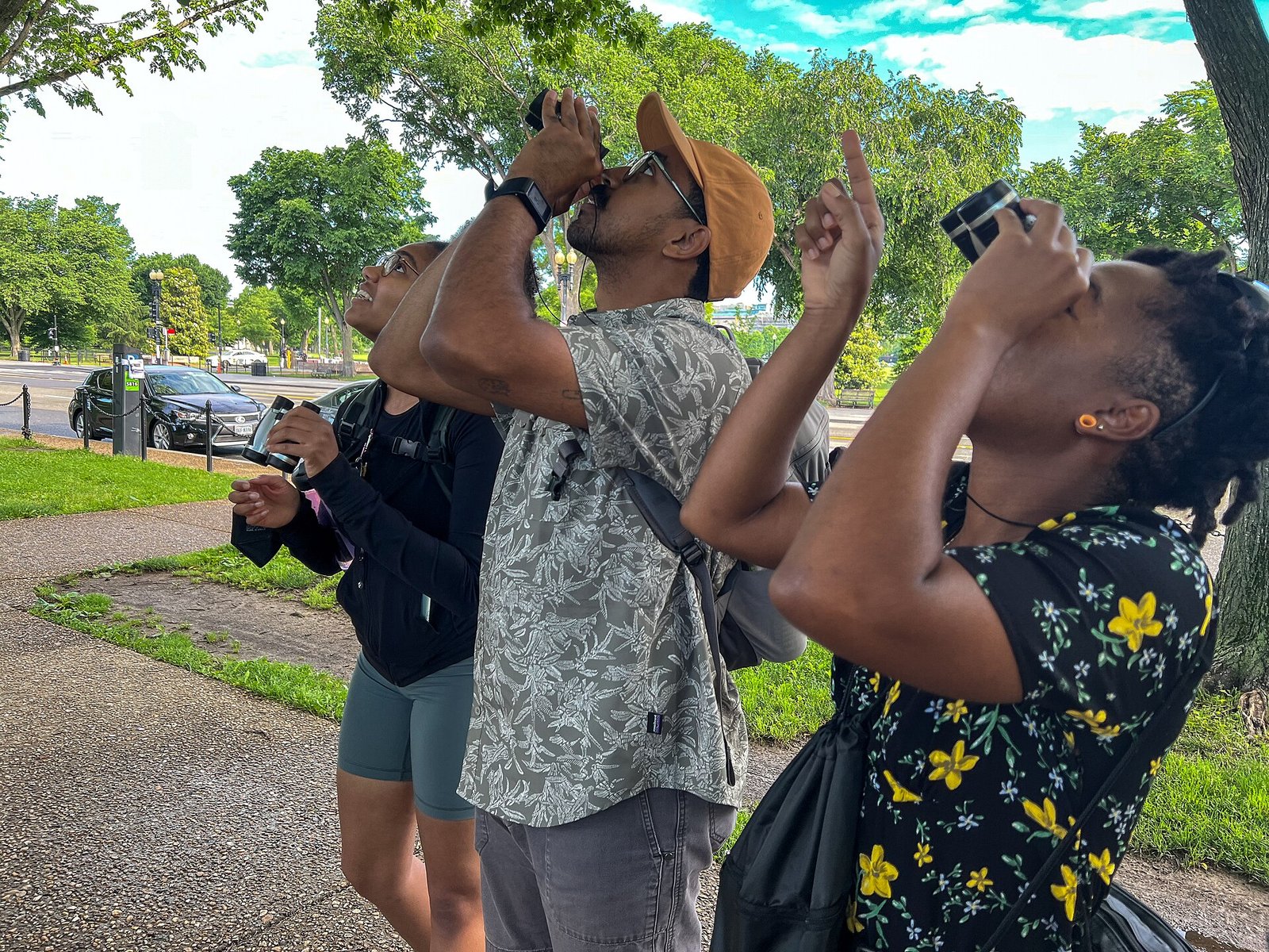 Birdwatchers with binoculars on a group walk, the kind of outing where hobby dating Gen Z singles now meet