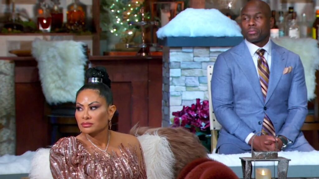 Jen Shah and her husband Sharrieff seated on the reunion set during The Real Housewives of Salt Lake City season 1 reunion, part 3